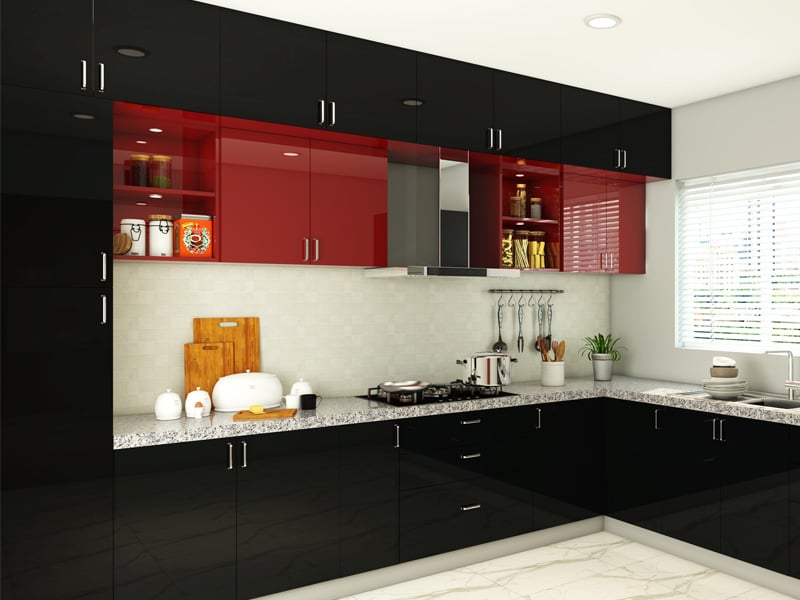 Black modular kitchen with red accent cabinets