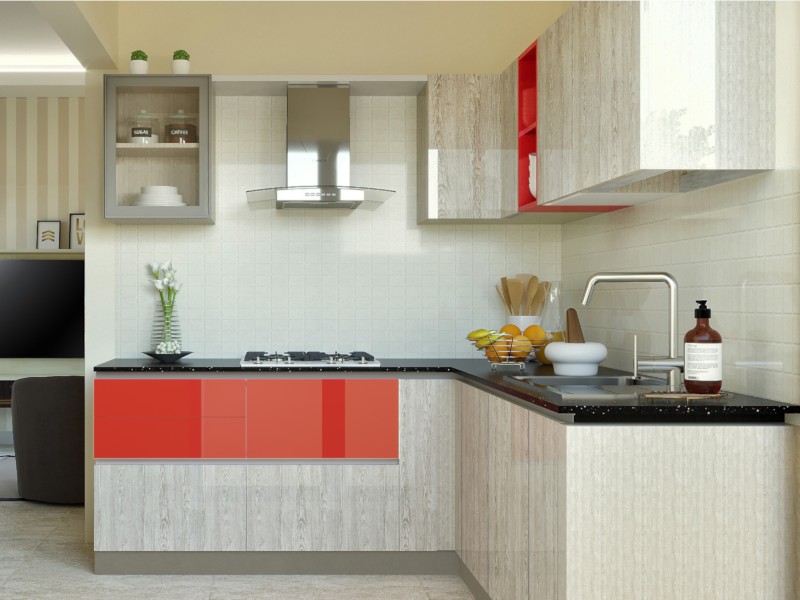 Corner modular kitchen with red accent cabinets